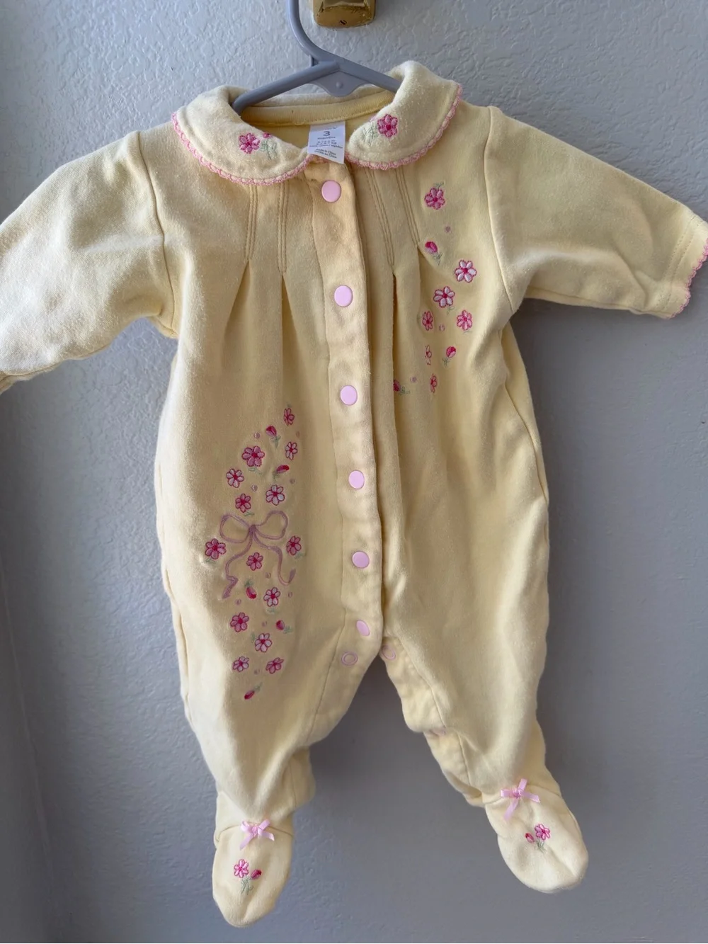 Carter's Yellow Floral Footed One-Piece with Pink Accents